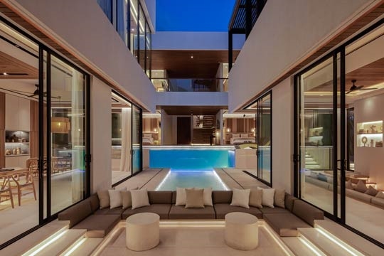 Sunken seating area viewing the pool